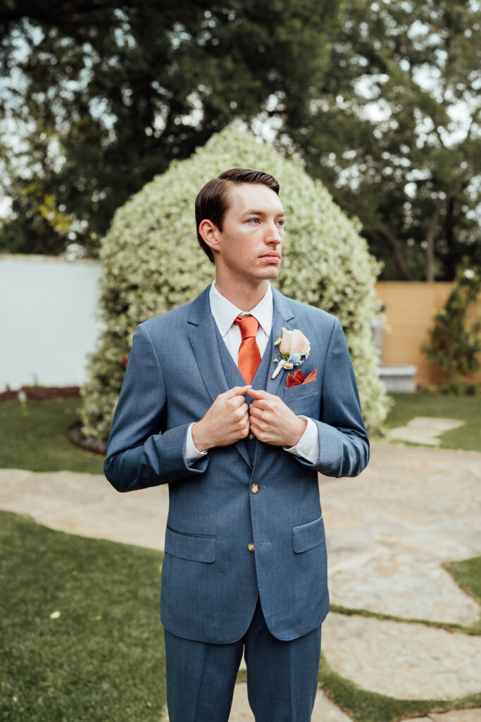 Groom with steamed suit for wedding