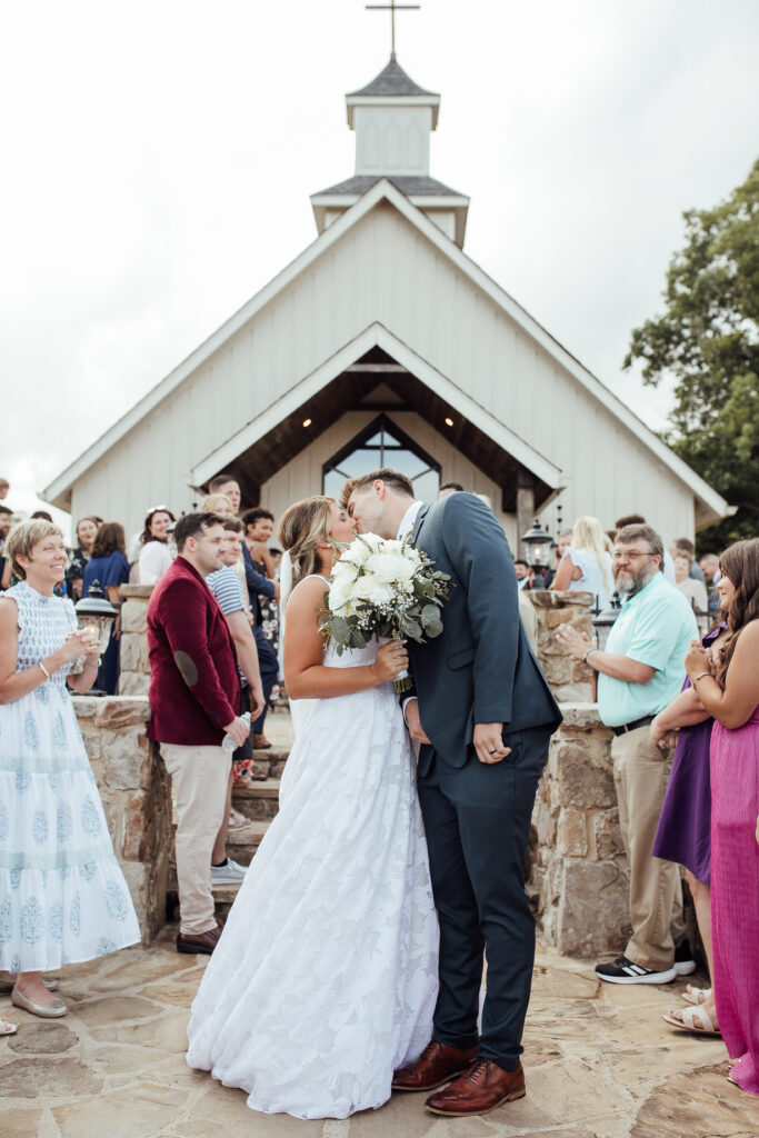 Bride and groom outside church