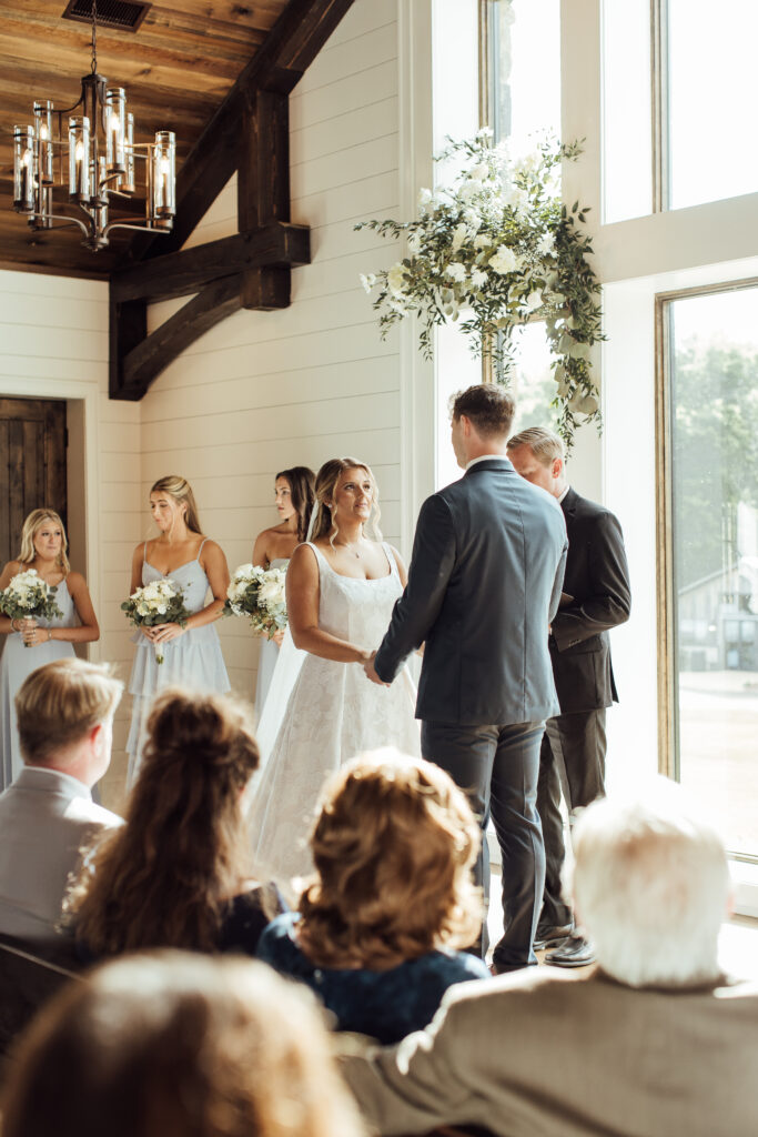 Bride and groom performing their wedding ceremony