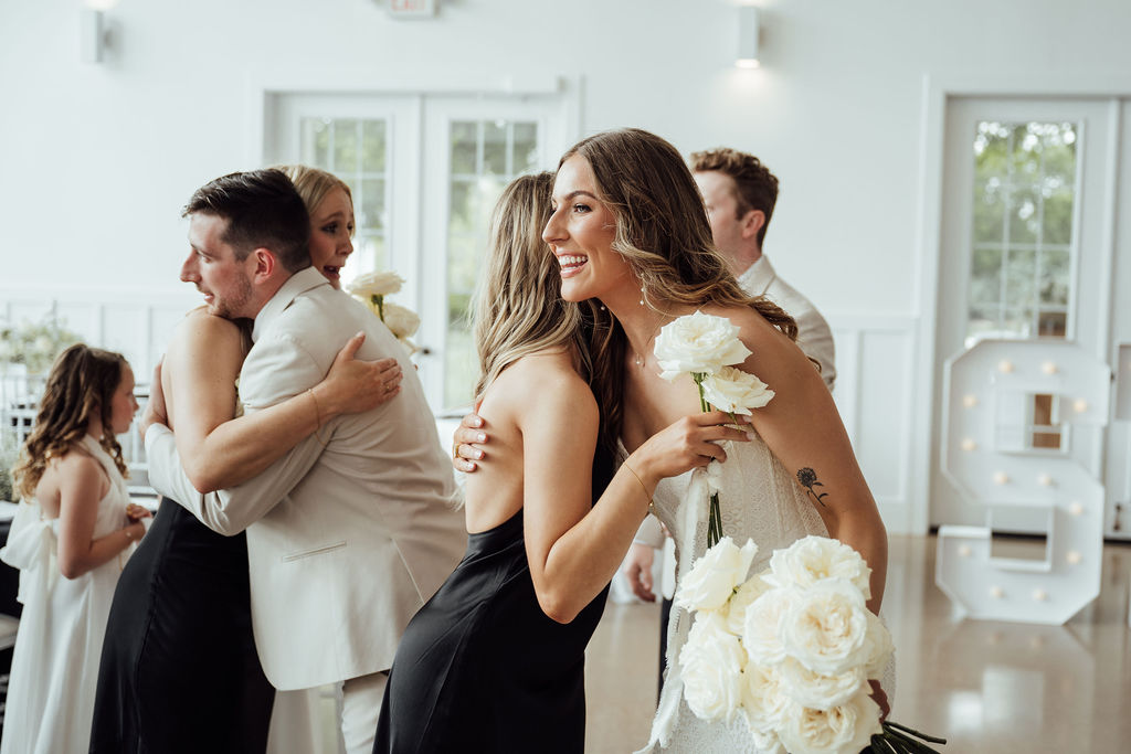 Couple hugs during wedding reception